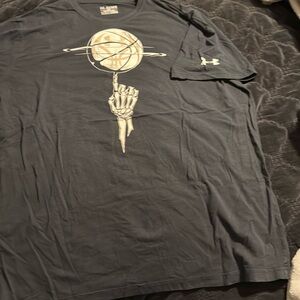 Under Armour, black with white T-shirt size XXL.